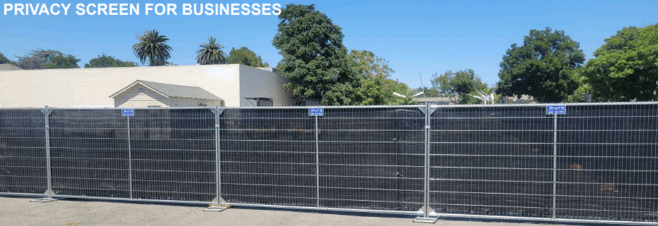 Privacy screen fencing around business area.